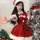 A festive santa-themed red velvet robe with white trim and bow accents, perfect for holiday celebrations.
