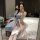 Vintage chinese-inspired sheer chiffon hanfu dress with seductive palace-style doudou, perfect for elegant evening wear.