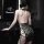 Woman wearing black vintage lace side-tie cheongsam lingerie set with pearl back detail, seductive bedroom costume design.