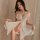 Woman wearing wangchunshan sheer butterfly lingerie set with lace mesh cutouts, sensual sleepwear in soft white tone.