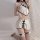 Water-infused lace lingerie set featuring a seductive cut-out cheongsam style bodysuit with halter neck and matching thong.