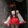 A person wears a white moonlight japanese-style lingerie set featuring red sensual sleep dress with bow and tassel accents, s...