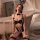 Woman in black lace bunny costume with open-cup bodysuit, mesh details, and removable crotch, posing seductively.