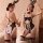 Two women modeling a black mesh bunny costume with lace trim, open cups, and removable crotch for seductive rabbit girl look.