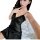 Woman wearing black silky deep v lingerie nightgown with lace trim, sensual sleepwear set for adults.