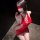 Woman in red sheer mesh lingerie set with tear-away design, featuring a bra and panty, exuding elegance and sensuality.