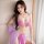 Woman modeling a pink and purple exotic lace lingerie set with gold accents, designed for small busts. elegant vintage-inspir...