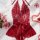 Womens full lace sheer bodysuit featuring intricate lace design, deep v-neckline, and elegant red ribbon waistband, perfect f...