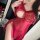 Woman wearing red lace butterfly knot mesh slip dress, seductive date night sleepwear set with sheer fabric and delicate deta...