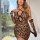 Sexy womens leopard print lace chemise with black lace details, long sleeves, and a plunging neckline, perfect for evening we...