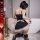 Sexy maid costume for women, featuring a black dress with lace details and stockings, perfect for role play and adult enterta...