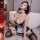 Sexy maid costume for women, featuring lace details and stockings, perfect for role play and adult entertainment.