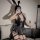 Womens pu lace-up halter mini skirt set with bunny ears, cute devil cosplay outfit featuring sexy uniform design.