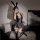 Womens pu lace-up halter mini skirt set with bunny ears and stockings, perfect for kawaii devil cosplay outfits.