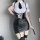Sexy teacher role play outfit featuring a white blouse, black leather skirt, corset, stockings, and tie accessory.