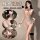 Woman modeling black lace bodysuit with sheer mesh stockings, featuring floral patterns and a seductive design for intimate w...