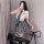 Womens seductive lingerie set - schoolgirl costume outfit, featuring a short plaid skirt, white blouse, and thigh-high stocki...