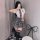Womens seductive lingerie set - schoolgirl costume outfit, featuring a white blouse with plaid tie, black skirt, and knee-hig...