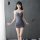 Womens sexy backless lingerie set - seductive bodycon passion dress with matching underwear, showcased on a model against a m...