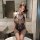 Sexy lace bodysuit with sheer mesh design, thigh-high black stockings, perfect for seductive sleepwear set.