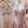 Womens floral lace bra set with push-up padded cups, waist-cinching corset top, and soft pink tulle skirt detail.