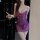 Woman in purple lace sleepwear holding wine glass, sheer lingerie set for intimate nights.