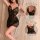 Woman modeling black lace sleepwear with sheer panels and adjustable straps, featuring a close-up of the bodice and back desi...