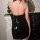 Sexy latex-style bodycon dress featuring sleek pu leather design, one-piece with skirt, perfect for bold fashion statements.
