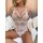 Woman wearing a sheer mesh lingerie bodysuit with lace trim and white straps, paired with a cozy cardigan.