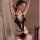 Woman wearing qqny black lace open-cup bodysuit with sheer panels and bow details, elegant sleepwear set.