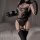 Woman wearing a sexy police uniform costume with lace lingerie, thigh-high stockings, and a badge, posing seductively on a be...