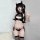 Woman in black pvc devil cosplay costume with horns, cutout top, and thigh-high stockings for anime lingerie look.