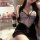 Woman in french-inspired lace cami set with bow detail, holding wine bottle; sheer bodysuit offers busty-friendly allure.