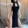 Woman wearing black high-waist split cheongsam lingerie set, reversible seductive bedroom outfit with no-remove design.