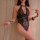 Vintage sexy maid outfit with lace and chain detail, perfect for role play, elegant and charming design