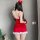 Red christmas-themed lingerie set featuring a festive design with fluffy accents, perfect for holiday celebrations.
