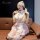 Elegant maid costume cosplay outfit featuring a charming pink and white checkered dress with lace details, perfect for date n...