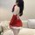Sexy christmas-themed womens costume featuring a red dress with white fur trim and lace-up back detail, perfect for role play...