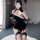 Sexy black cheongsam with white fur trim, holiday-themed nightclub costume for women, festive outfit.