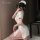 Woman in white xianyi nurse costume with open-crotch design, posing seductively for cosplay role play.
