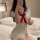 Woman wearing xintao sexy nurse costume set - role play lingerie outfit with sweet & seductive college style uniform, posing ...