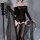Sexy off-shoulder bodysuit with sheer mesh design and high-waisted stockings set for women.