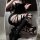 Edgy black y2k ripped thigh-high socks with lace-up leg warmers, perfect for bold fashion statements.
