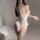 Woman wearing white yaqin lace bodysuit with open-crotch design, sheer mesh, and waist-cinching fit — sexy sleepwear for wome...