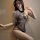 Woman wearing ye qing ge sexy transparent bodysuit – alluring black mesh lingerie one-piece with cutout details.