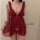 Sexy red sheer design with ruffled straps, perfect holiday costume or festive allure.