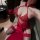 Sexy red halter nightgown ensemble with lace details and stockings, perfect for sensual elegance.