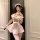 Woman wearing yeqin pink maid lingerie set with bear apron, frilly sleeves, and matching headpiece for intimate moments.