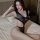 Woman wearing black mesh yeqingge sexy lingerie set on bed – passionate nightwear & bedroom costume outfit, plus size seducti...