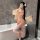 Vintage-inspired lingerie set featuring a chinese-style embroidered design, with a sheer corset and flowing skirt, perfect fo...